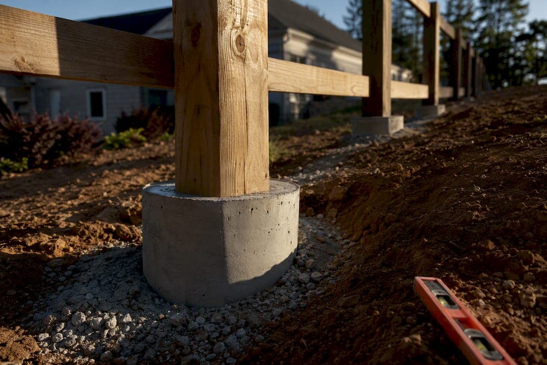 Avoid Early Failure: DIY Fencing a Sloped Yard With 2.5–3 ft Post Footings